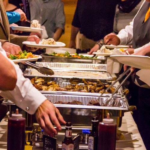 Catering line with chicken steak and potatos